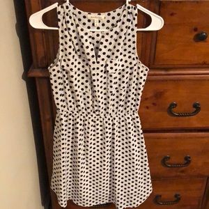 Black and white sleeveless polka dot dress